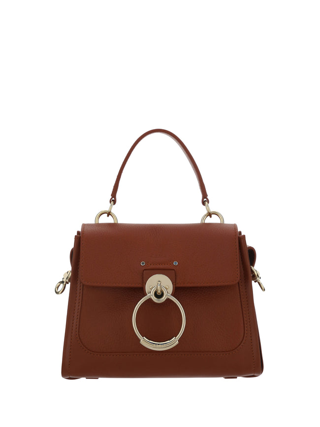 Elegant Sepia Brown Calfskin Shoulder HandbagImmerse yourself in the epitome of elegance with this stunning Chloé Tess Handbag. A standout piece with its rich Sepia Brown hue, crafted from the finest 100% Calf Leather Bos Taurus for an unparalleled luxuri