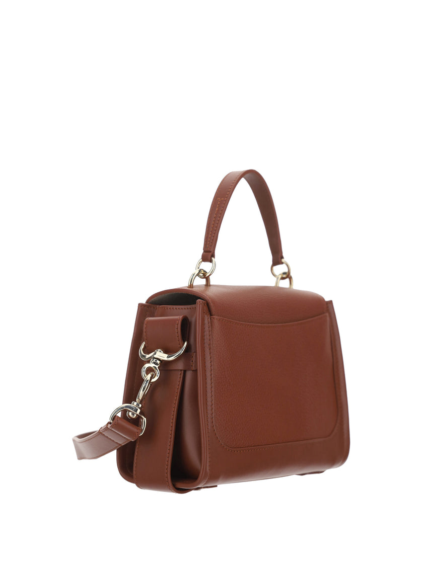 Elegant Sepia Brown Calfskin Shoulder HandbagImmerse yourself in the epitome of elegance with this stunning Chloé Tess Handbag. A standout piece with its rich Sepia Brown hue, crafted from the finest 100% Calf Leather Bos Taurus for an unparalleled luxuri