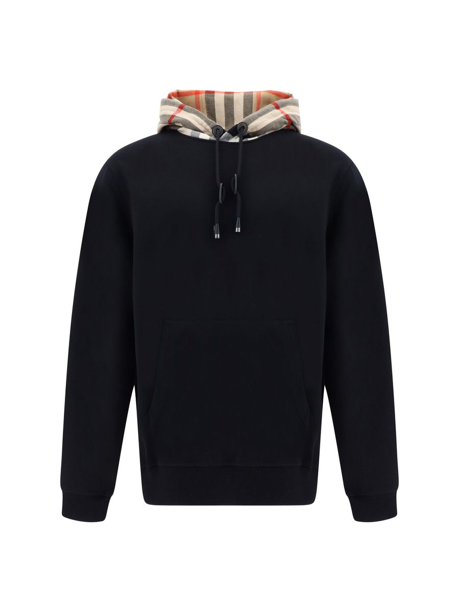 Elegant Oversize Black Samuel HoodieDiscover the epitome of comfort infused with the quintessential touch of luxury with this Burberry Samuel Hoodie. Tailored to exude style, this hoodie features a drawstring hood for a personalized fit and is accented wi