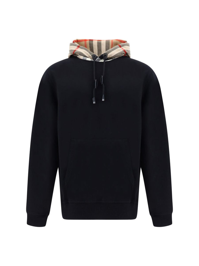 Elegant Oversize Black Samuel HoodieDiscover the epitome of comfort infused with the quintessential touch of luxury with this Burberry Samuel Hoodie. Tailored to exude style, this hoodie features a drawstring hood for a personalized fit and is accented wi