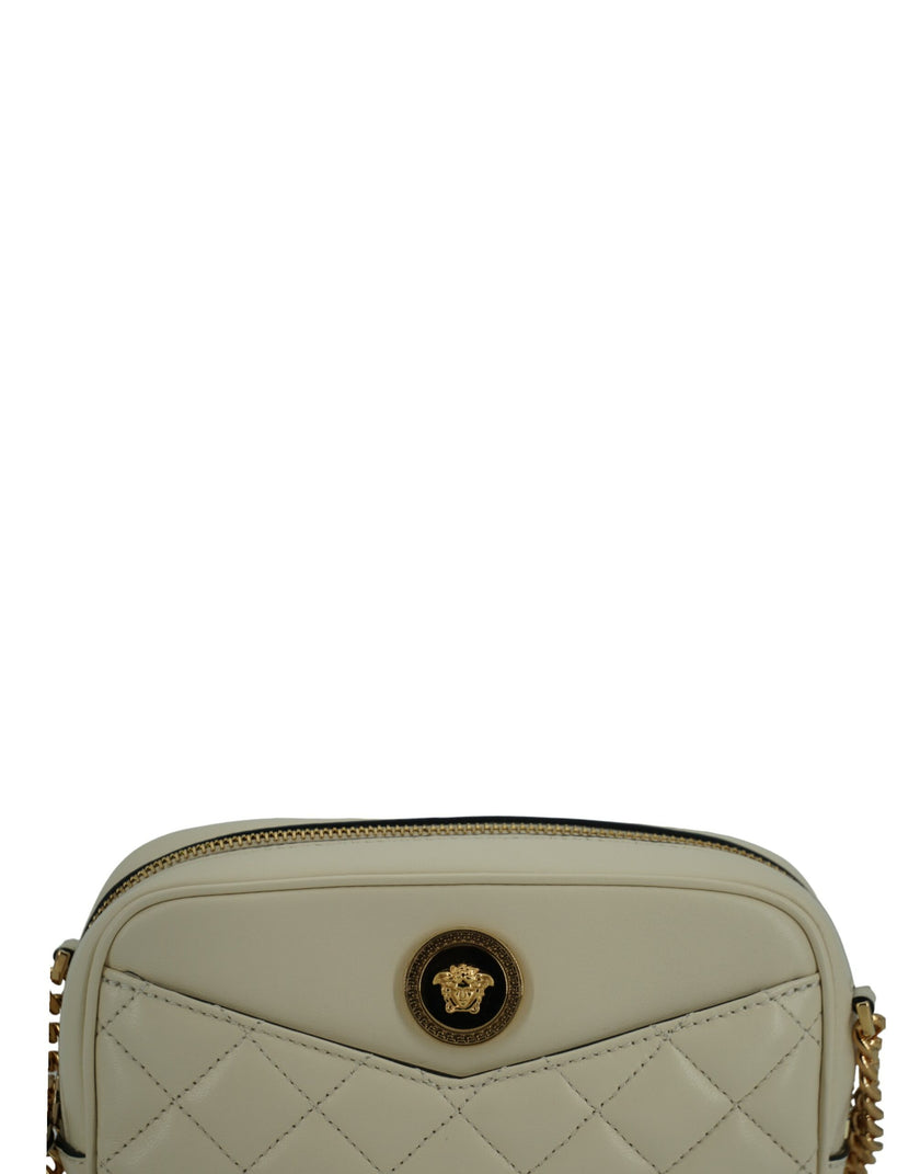 Elegant White Lamb Leather Camera BagIndulge in the elegance of the Versace Camera Crossbody Bag, crafted for those who appreciate luxury and style. This stunning accessory is your perfect companion for any occasion, blending fashion and functionality sea