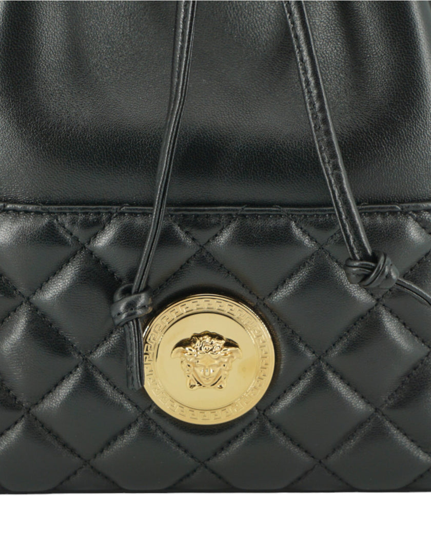 Elegant Black Leather Medusa Bucket Shoulder BagStep out in style with the exquisite Versace Bucket Shoulder Bag, a perfect blend of elegance and functionality. This beautiful accessory, complete with tags and a dust bag, is more than just a bag—it’s a st