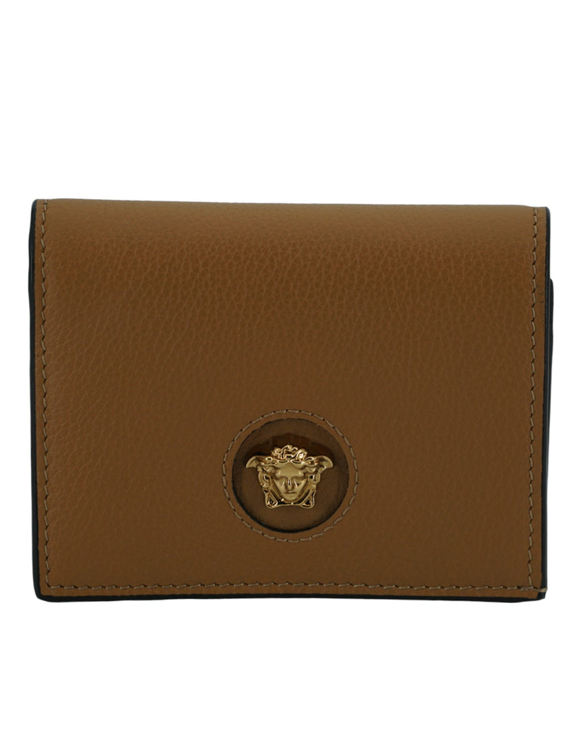Elegant Compact Leather Wallet in BrownIndulge in the luxury of a Versace compact wallet, a sophisticated accessory that blends functionality with high fashion. Known for its exquisite Italian craftsmanship, this compact wallet is perfect for the chic ind