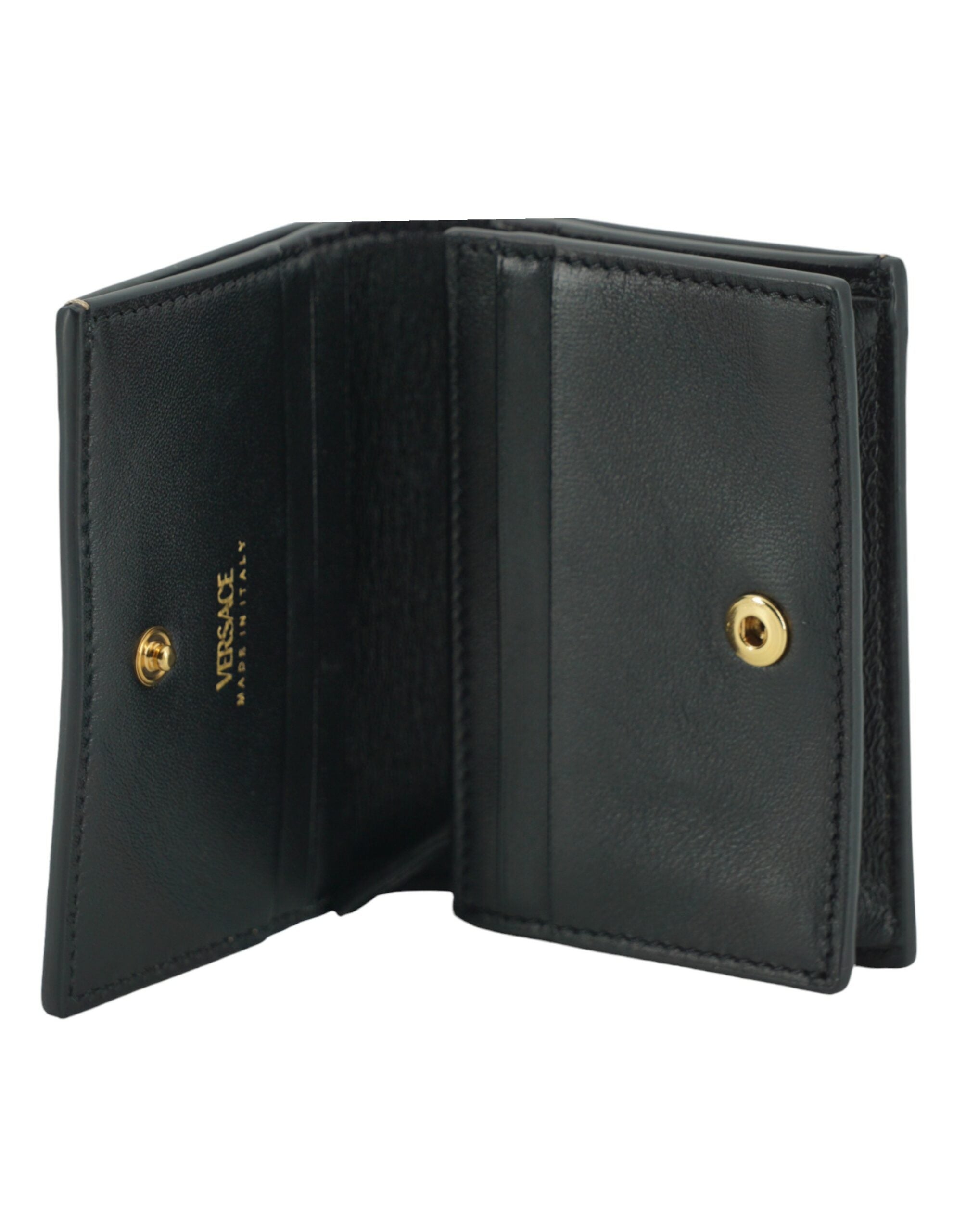 Elegant Compact Leather Wallet in BrownIndulge in the luxury of a Versace compact wallet, a sophisticated accessory that blends functionality with high fashion. Known for its exquisite Italian craftsmanship, this compact wallet is perfect for the chic ind