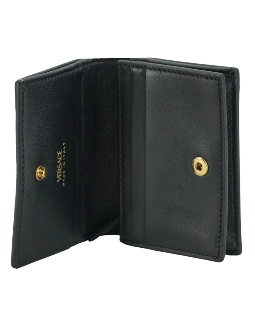 Elegant Compact Leather Wallet in BrownIndulge in the luxury of a Versace compact wallet, a sophisticated accessory that blends functionality with high fashion. Known for its exquisite Italian craftsmanship, this compact wallet is perfect for the chic ind