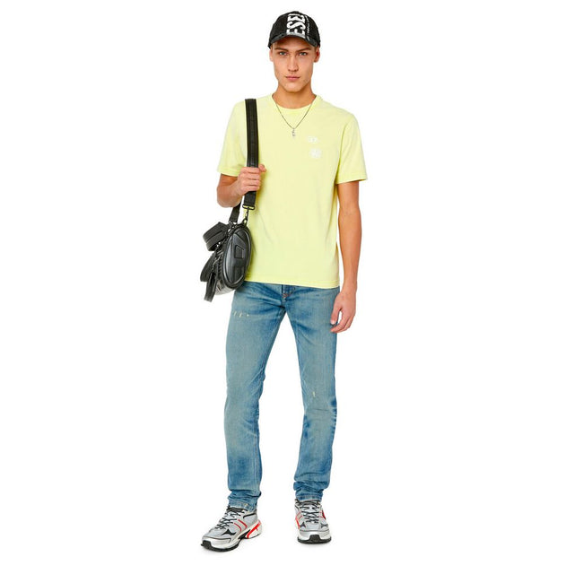 Blue Cotton Men's Skinny JeanCrafted for those who dare to stand out, these Diesel skinny jeans embody the essence of punk-rock spirit, while delivering a refined fit. A low waist meets a snug leg, from thigh to ankle, showcasing visible shaded and distre