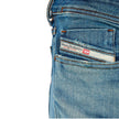 Blue Cotton Men's Skinny JeanCrafted for those who dare to stand out, these Diesel skinny jeans embody the essence of punk-rock spirit, while delivering a refined fit. A low waist meets a snug leg, from thigh to ankle, showcasing visible shaded and distre