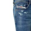 Blue Cotton Men Skinny JeanUnleash your rockstar edge with the Diesel Skinny jeans, artfully crafted with rebellion at their core. Featuring a low waist and a sleek narrow leg from thigh to ankle, these skinnies are made for those who dare to stand out. C