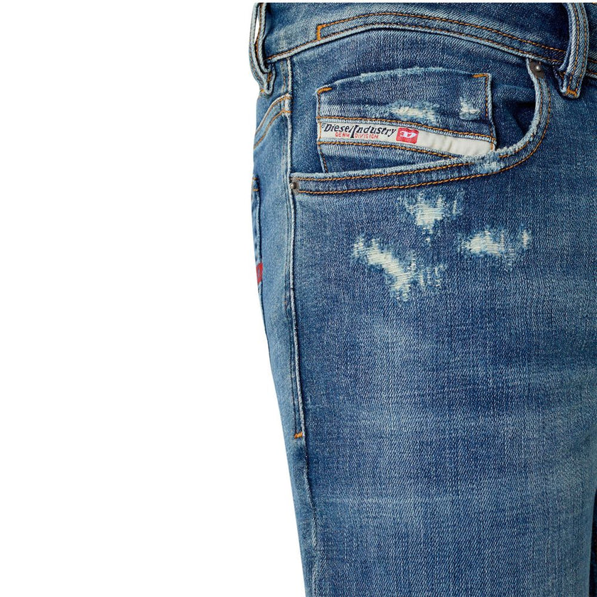 Blue Cotton Men Skinny JeanUnleash your rockstar edge with the Diesel Skinny jeans, artfully crafted with rebellion at their core. Featuring a low waist and a sleek narrow leg from thigh to ankle, these skinnies are made for those who dare to stand out. C