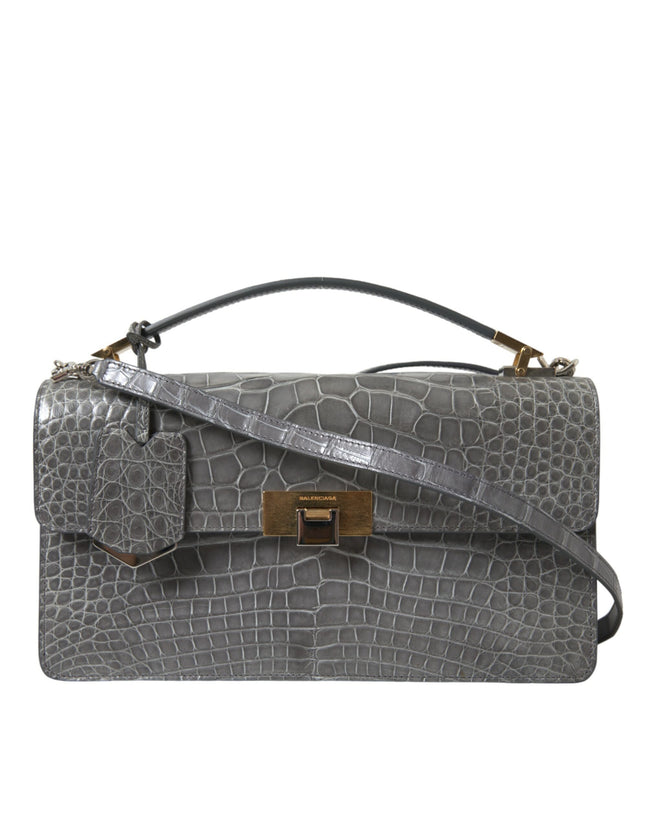 Gray Exotic Leather Medium Shoulder Hand Purse BagBALENCIAGA Gorgeous brand new, 100% Authentic BALENCIAGA alligator leather medium shoulder bag. Model: Hand shoulder, Le Dix Poch.Ca.St AJ Material: 100% Alligator Leather Colour: Grey Strap: One handle, d