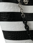 Black White Striped Exotic Skin Leather Maxi Bucket Tote BagBALENCIAGA Absolutely stunning, 100% Authentic, brand new with tags BALENCIAGA crocodile leather maxi bucket bag. Model: Bucket bag Color: Black, White Material: 75% Crocodile 15% Lamb Leather 10