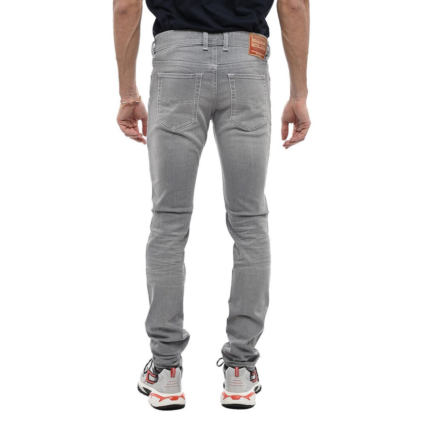 Gray Cotton Men Skinny JeanDiesel redefines contemporary casual with the Sleenker-X skinny jeans. A masterful fusion of fashion and comfort, these jeans feature a figure-hugging cut crafted from slightly elastic denim that offers effortless movement and t