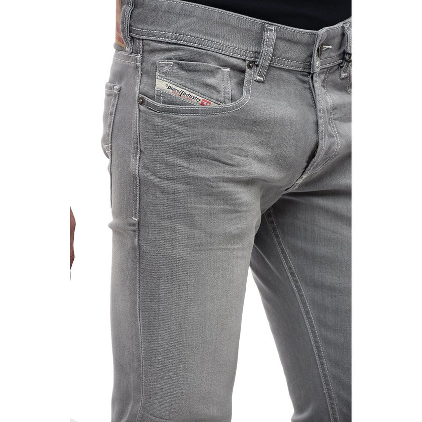 Gray Cotton Men Skinny JeanDiesel redefines contemporary casual with the Sleenker-X skinny jeans. A masterful fusion of fashion and comfort, these jeans feature a figure-hugging cut crafted from slightly elastic denim that offers effortless movement and t