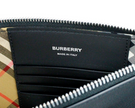 Peyton Monogram Black Leather Pouch Crossbody Bag PurseStyle: Burberry Peyton Monogram Black Pouch Crossbody Bag Material: Grainy Leather Features: 4 Inner Card Slots, Adjustable/Detachable Crossbody Strap, Zip Closure, House Check Lining Measures: 27cm L