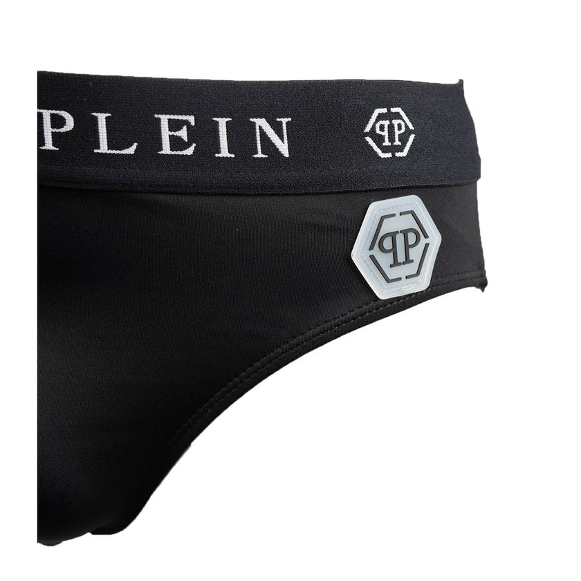 Black Polyamide Men SwimwearDive into luxury with Philipp Plein’s sleek men’s swim briefs. Designed for the man who commands attention, these swim bottoms are crafted from a premium blend of polyamide and elastane that contours and comforts. Featuring a b