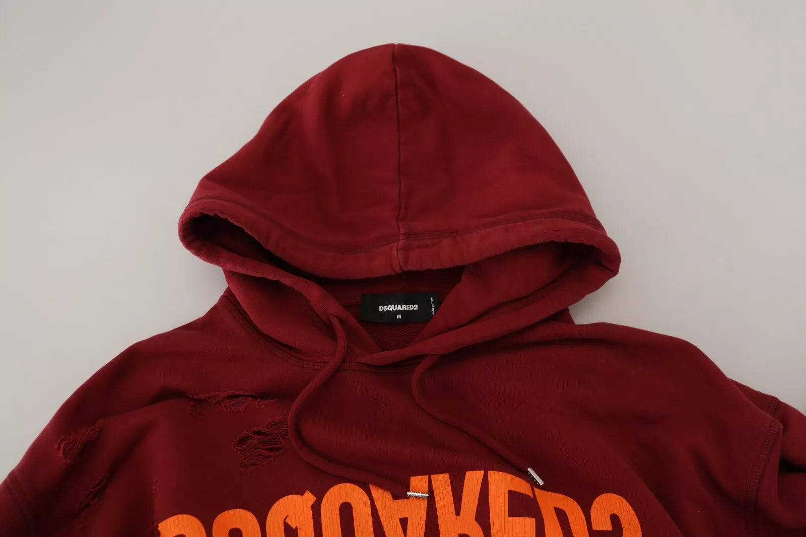 Pull à capuche imprimé en coton bordeaux à bords déchirés