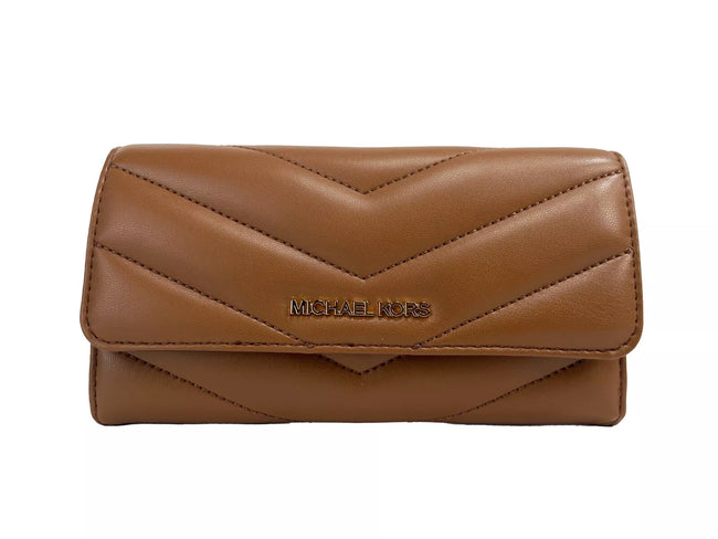 Jet Set Travel Large Quilted Leather Trifold Wallet BrownStyle: Michael Kors Jet Set Travel Large Quilted Trifold Wallet Luggage Brown Material: Leather Features: Flap with Button Closure, Photo ID Holder, 7 Card Slots Measures: 17.78 cm L x 10.16 cm H x