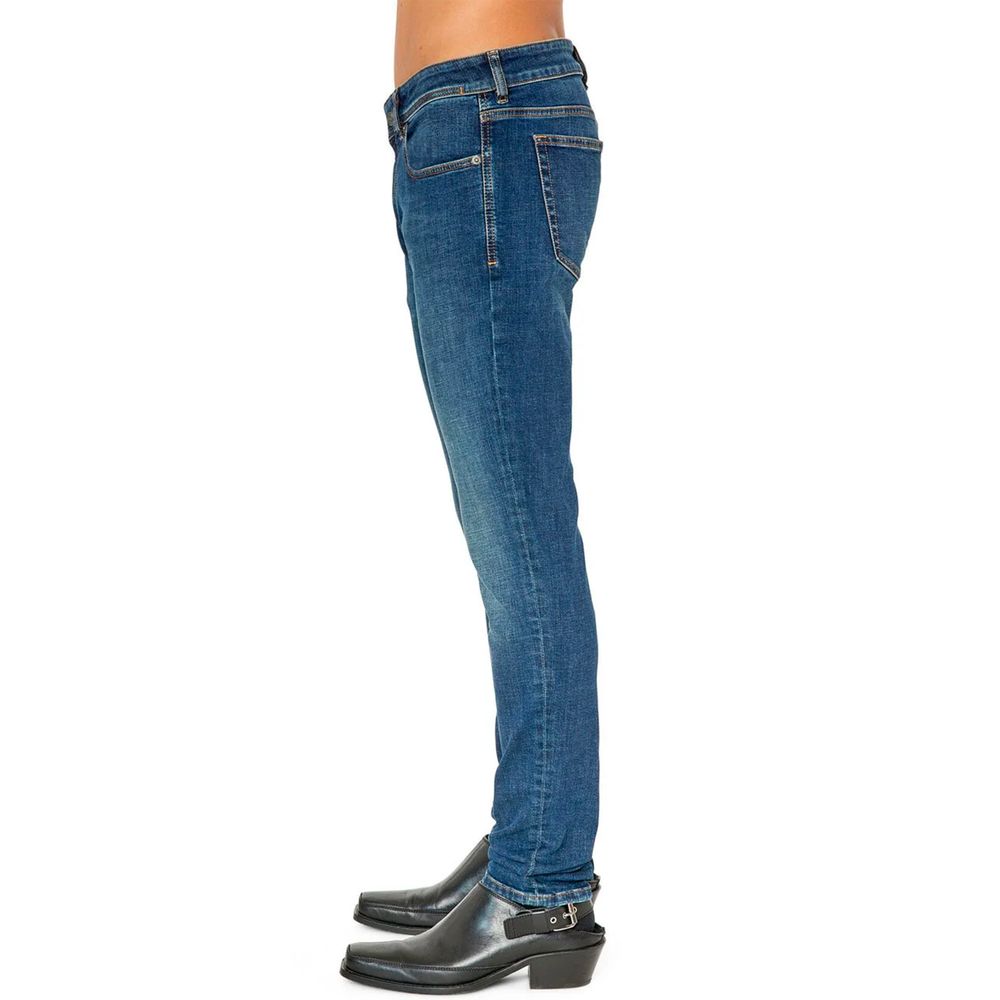 Blue Cotton Men JeansElevate your wardrobe essentials with these Diesel denims that blend comfort with edgy style. Crafted with just the right amount of stretch, these skinny fit jeans are a testament to the brand’s dedication to superior quality and cont