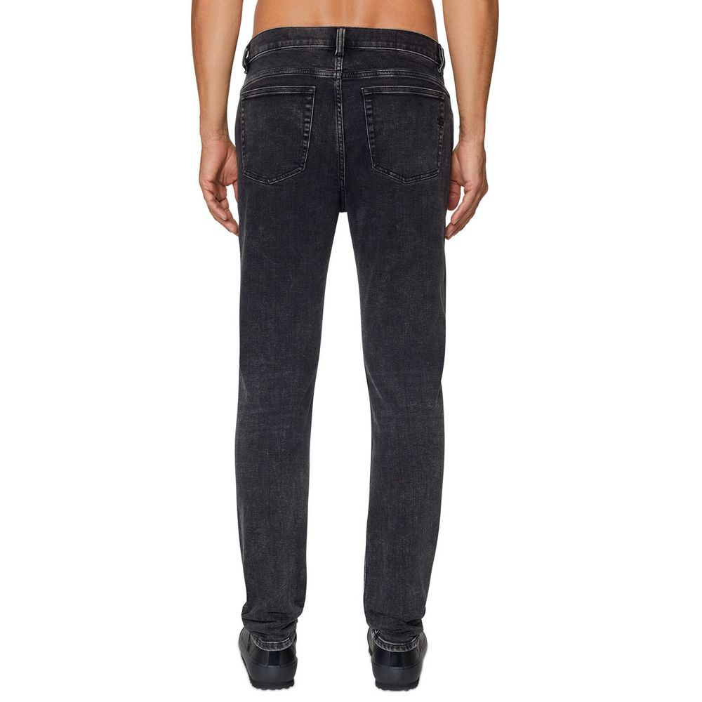 Black Cotton Men JeanElevate your wardrobe with the Diesel denim skinny jeans, epitomizing the fusion of edgy rock flair and 80s chic. These high-waisted, skintight marvels crafted from premium cotton and elastane promise a perfect blend of comfort with a