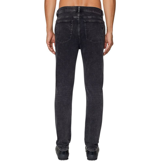 Black Cotton Men JeanElevate your wardrobe with the Diesel denim skinny jeans, epitomizing the fusion of edgy rock flair and 80s chic. These high-waisted, skintight marvels crafted from premium cotton and elastane promise a perfect blend of comfort with a