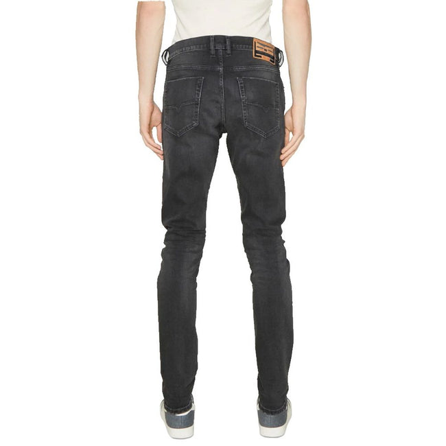 Black Cotton Men JeansTransform your wardrobe with the ultimate blend of comfort and style in these Diesel jeans. Crafted from premium cotton with just the right touch of elastane for a slight stretch, these faded black jeans are a must-have for any fashi