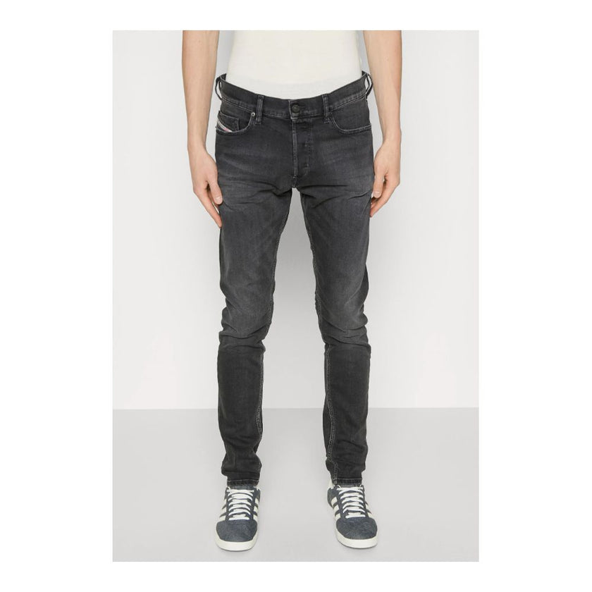 Black Cotton Men JeansTransform your wardrobe with the ultimate blend of comfort and style in these Diesel jeans. Crafted from premium cotton with just the right touch of elastane for a slight stretch, these faded black jeans are a must-have for any fashi