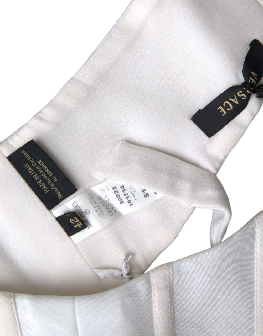 White Viscose Bustier Sleeveless Cropped TopGIANNI VERSACE Gorgeous brand new with tags, 100% Authentic GIANNI VERSACE bustier cropped tank top. Model: Tank top Colour: White Material: 61% Viscose 15% Silk 13% Nylon 11% Elastane Hook closure Logo details