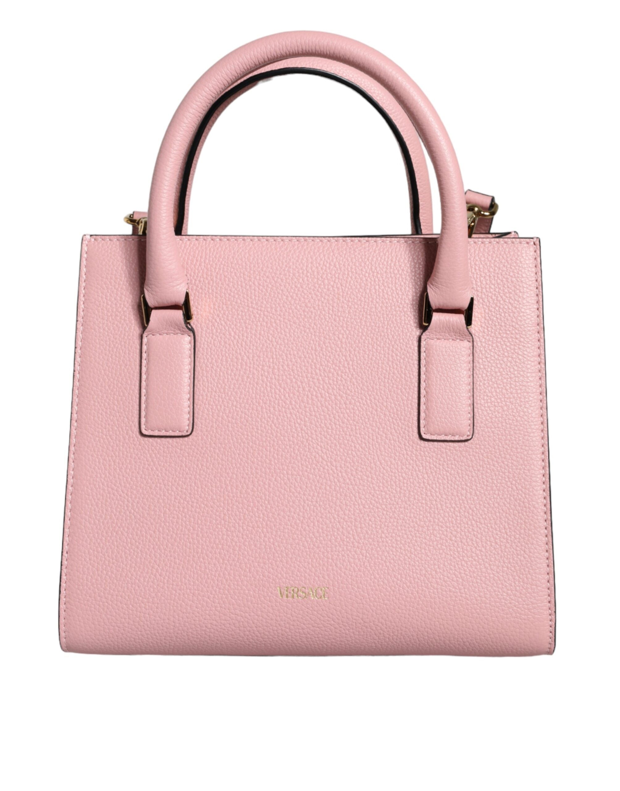 Pink Small Top Handle Grainy Calf Leather Crossbody BagVERSACE Absolutely stunning, 100% Authentic, brand new with tags VERSACE bags. Brand logo, solid color, crossbody strap, magnetic fastening. Model: Crossbody bag Material: 100% VL, 100% CO Colour: Pin