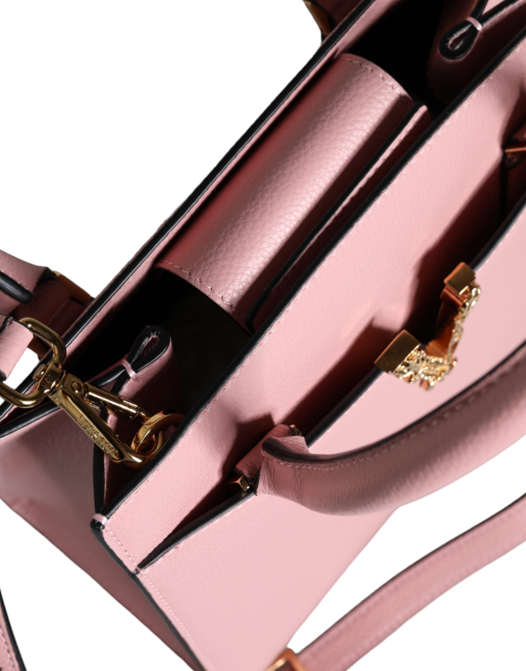 Pink Small Top Handle Grainy Calf Leather Crossbody BagVERSACE Absolutely stunning, 100% Authentic, brand new with tags VERSACE bags. Brand logo, solid color, crossbody strap, magnetic fastening. Model: Crossbody bag Material: 100% VL, 100% CO Colour: Pin