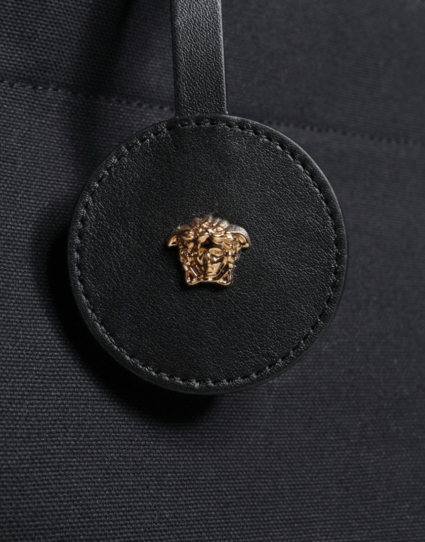 Black Top Handle Canvas Leather Logo Crossbody Tote BagVERSACE Absolutely stunning, 100% Authentic, brand new with tags VERSACE bags. Brand logo, solid color, crossbody strap, zipper fastening. Model: Crossbody bag Material: VL100%, WV66% VI19% PA10% WS5%