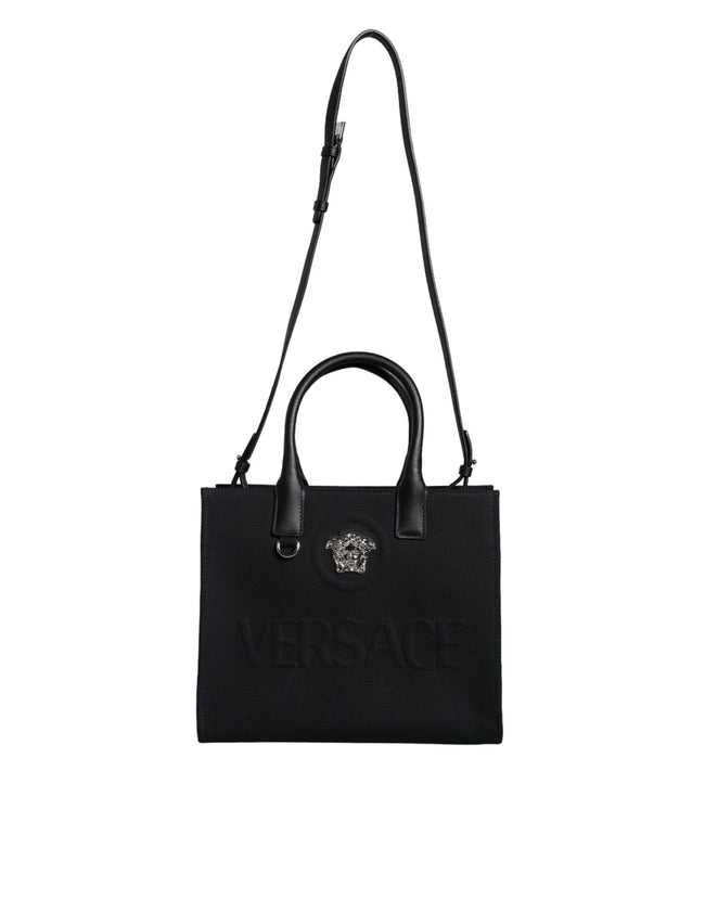 Black Top Handle Canvas Leather Logo Crossbody Tote BagVERSACE Absolutely stunning, 100% Authentic, brand new with tags VERSACE bags. Brand logo, solid color, crossbody strap, snap button fastening. Model: Crossbody bag Material: 100% VL, 100% CO Colour: