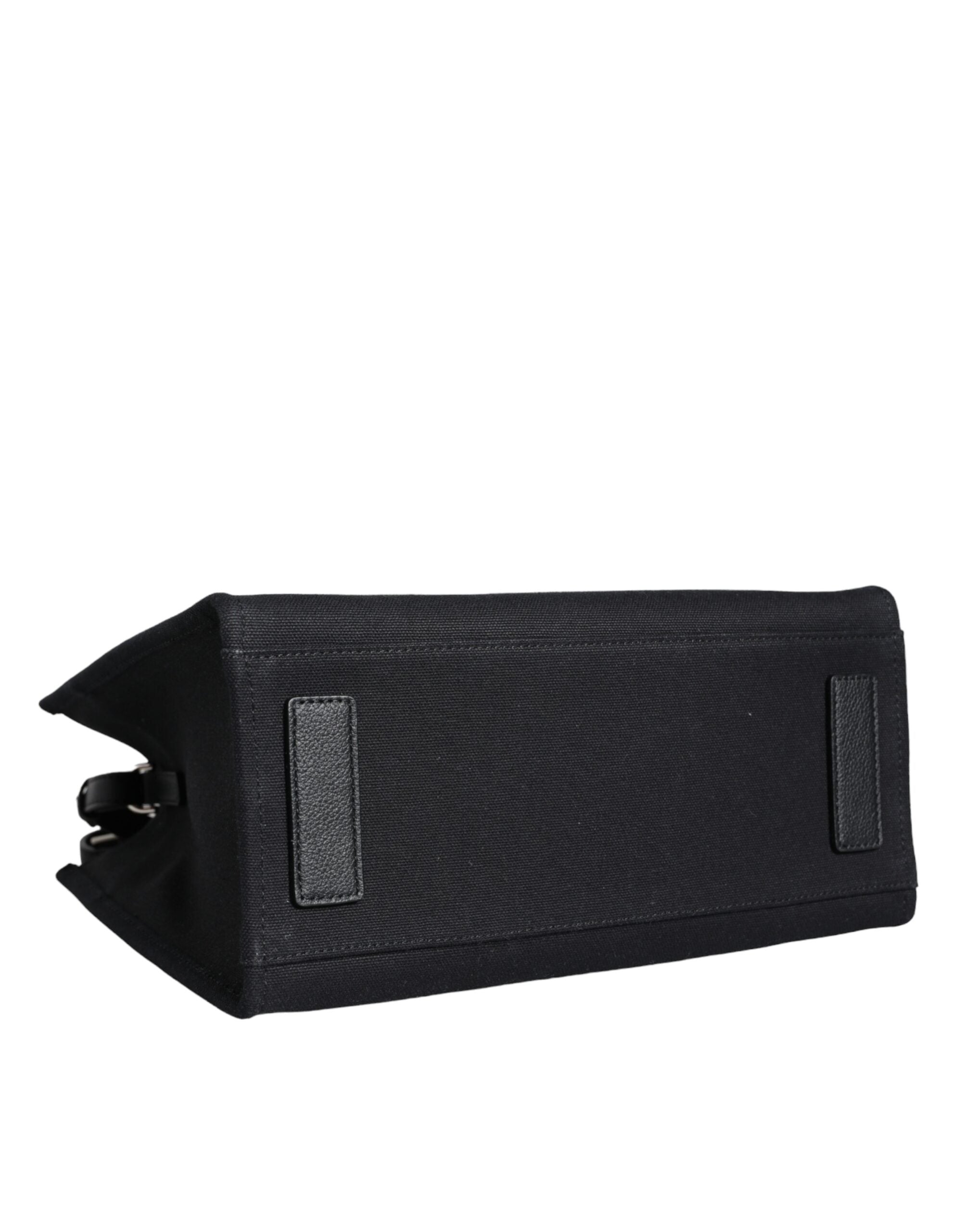 Black Top Handle Canvas Leather Logo Crossbody Tote BagVERSACE Absolutely stunning, 100% Authentic, brand new with tags VERSACE bags. Brand logo, solid color, crossbody strap, snap button fastening. Model: Crossbody bag Material: 100% VL, 100% CO Colour: