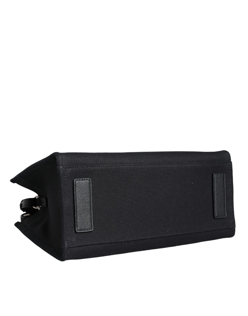 Black Top Handle Canvas Leather Logo Crossbody Tote BagVERSACE Absolutely stunning, 100% Authentic, brand new with tags VERSACE bags. Brand logo, solid color, crossbody strap, snap button fastening. Model: Crossbody bag Material: 100% VL, 100% CO Colour: