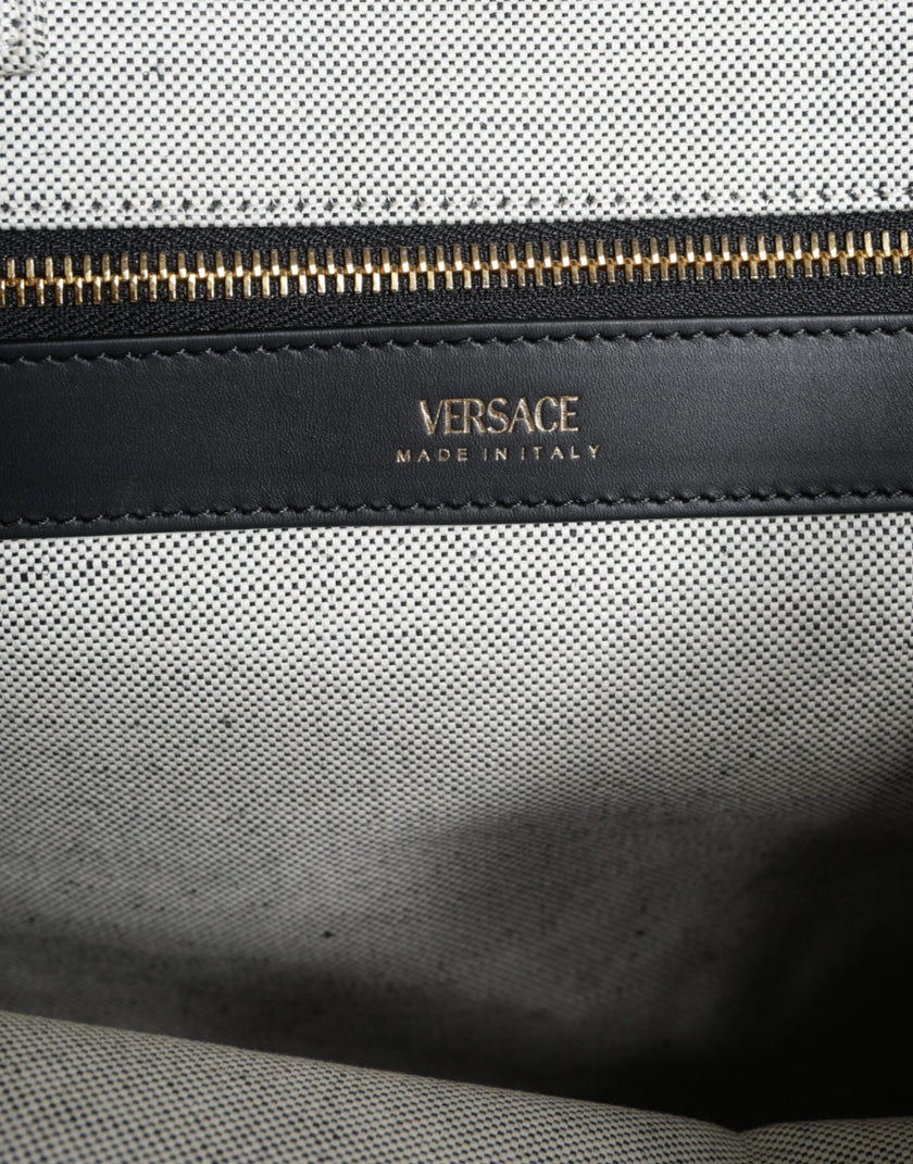 White Top Handle Canvas Leather Logo Crossbody Tote BagVERSACE Absolutely stunning, 100% Authentic, brand new with tags VERSACE tote bags. Brand logo, solid color, crossbody strap. Model: Tote bag Material: VL100%, WV66% VI19% PA10% WS5% Color: White, Bla