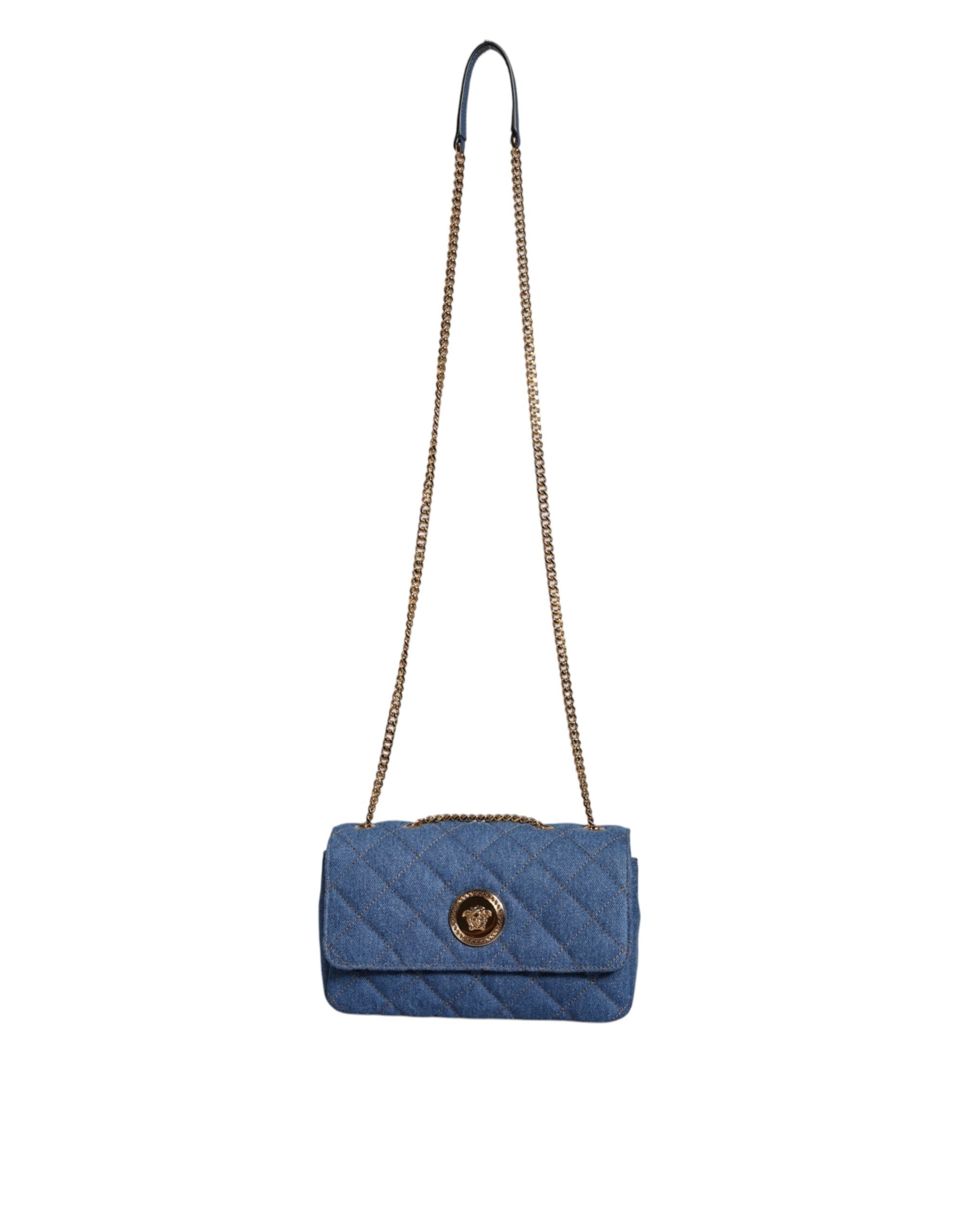 Blue Quilted Denim Leather Crossbody Shoulder BagVERSACE Absolutely stunning, 100% Authentic, brand new with tags VERSACE bags. Brand logo, solid color, crossbody strap. Model: Crossbody bag Material: 100% AOS, 100% CO Colour: Blue Black inner lining with