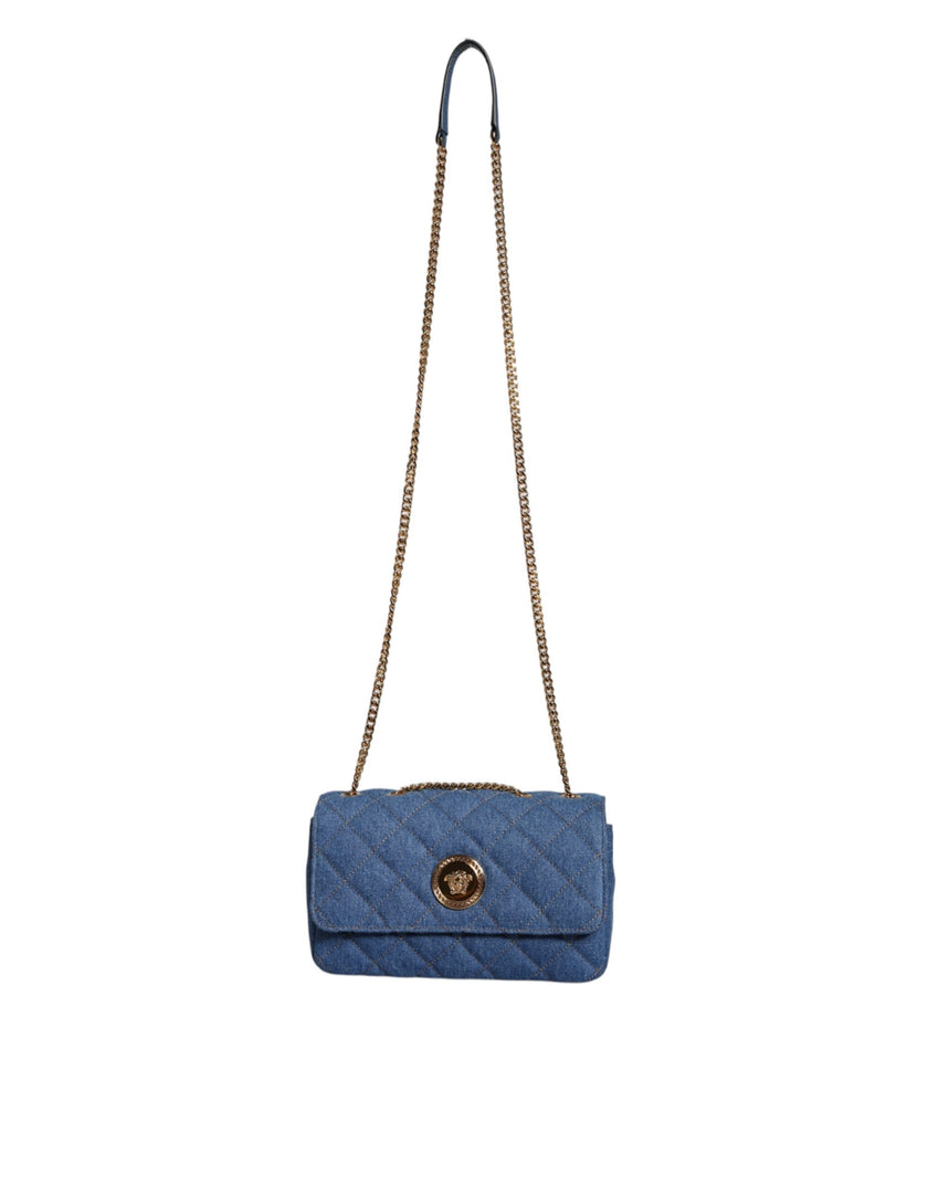 Blue Quilted Denim Leather Crossbody Shoulder BagVERSACE Absolutely stunning, 100% Authentic, brand new with tags VERSACE bags. Brand logo, solid color, crossbody strap. Model: Crossbody bag Material: 100% AOS, 100% CO Colour: Blue Black inner lining with