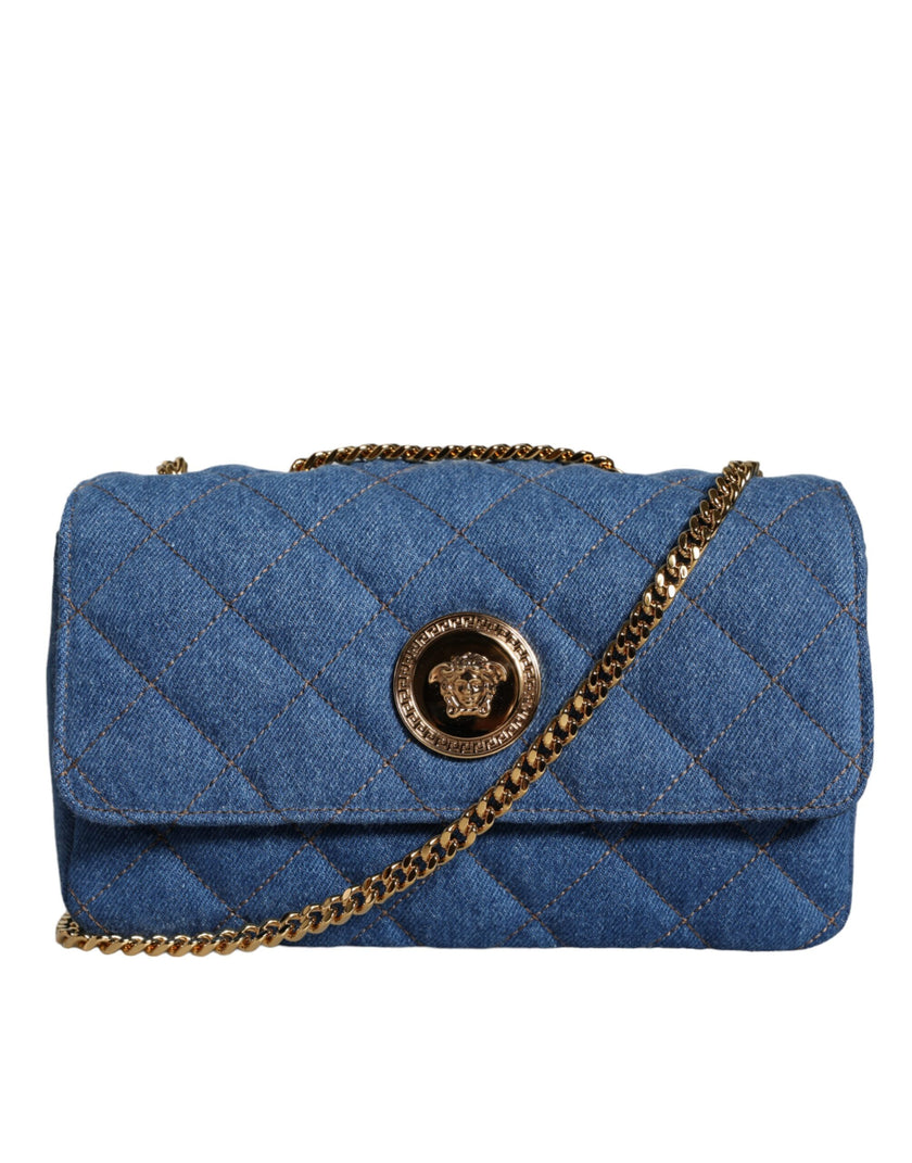 Blue Quilted Denim Leather Crossbody Shoulder BagVERSACE Absolutely stunning, 100% Authentic, brand new with tags VERSACE bags. Brand logo, solid color, crossbody strap. Model: Crossbody bag Material: 100% AOS, 100% CO Colour: Blue Black inner lining with