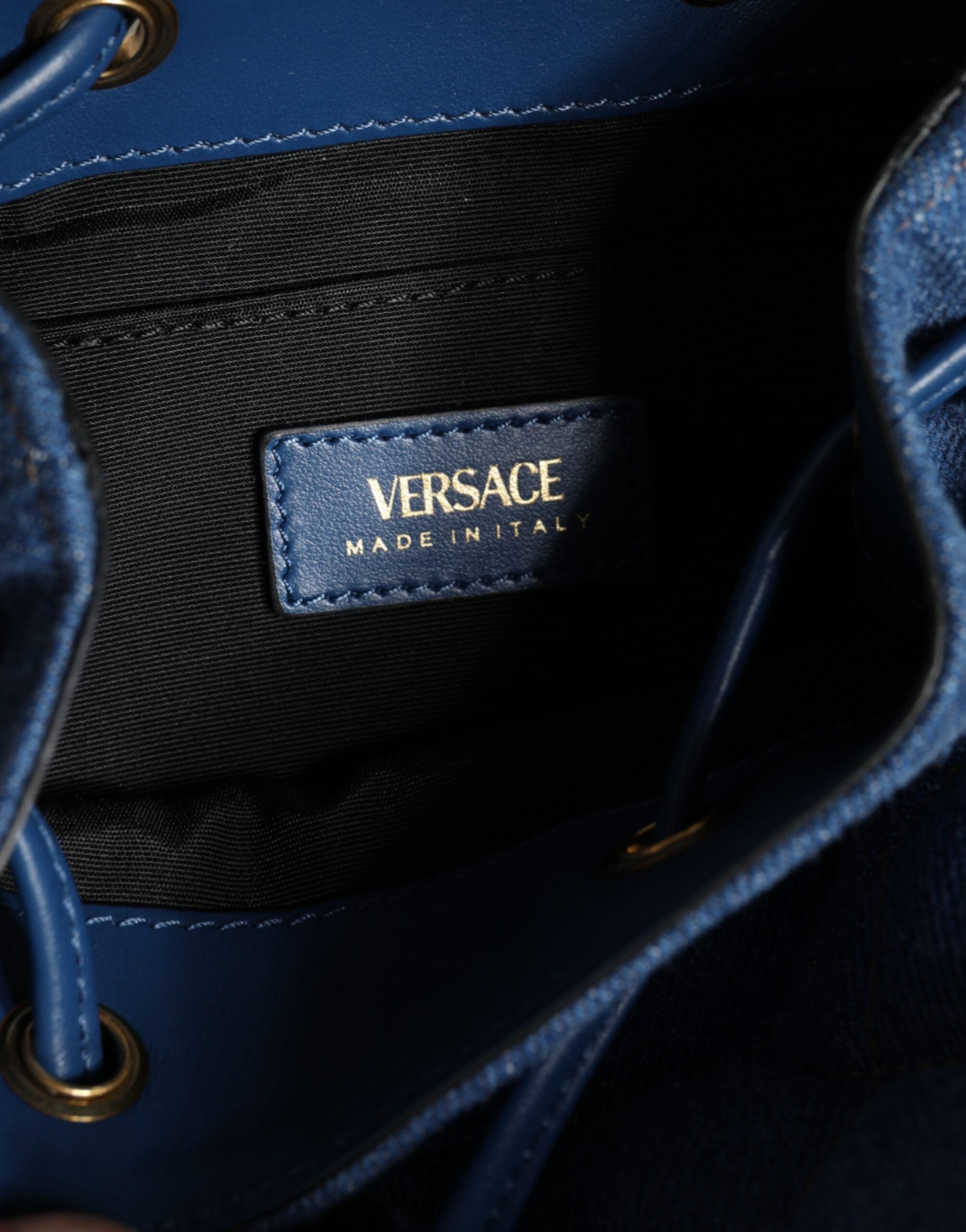 Blue Quilted Denim Leather Crossbody Shoulder BagVERSACE Absolutely stunning, 100% Authentic, brand new with tags VERSACE bags. Brand logo, solid color, crossbody strap. Model: Crossbody bag Material: VL100%, CO60% VI40% Colour: Blue Black inner lining wi