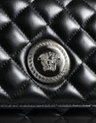 Black Quilted Lambskin Leather Crossbody Shoulder BagVERSACE Absolutely stunning, 100% Authentic, brand new with tags VERSACE bags. Brand logo, solid color, crossbody strap. Model: Crossbody bag Material: AOS100%, CO60% VI40% Colour: Black Fabric inner li