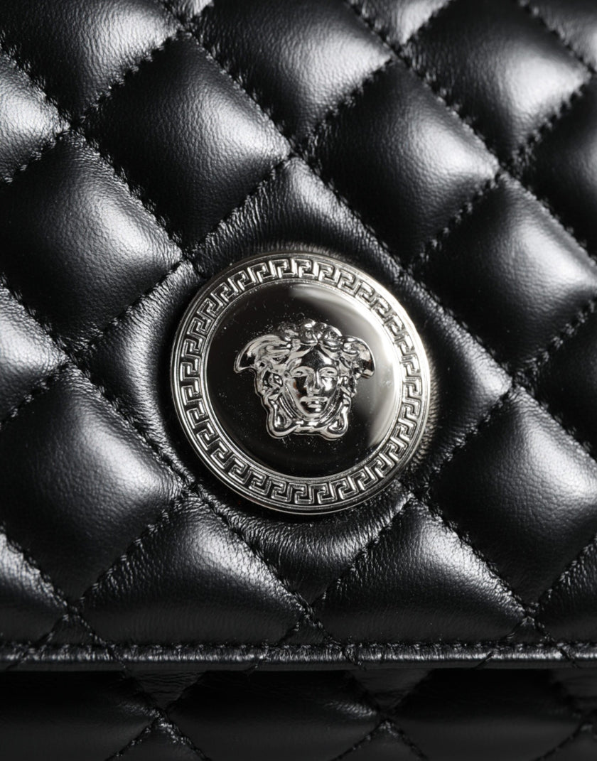 Black Quilted Lambskin Leather Crossbody Shoulder BagVERSACE Absolutely stunning, 100% Authentic, brand new with tags VERSACE bags. Brand logo, solid color, crossbody strap. Model: Crossbody bag Material: AOS100%, CO60% VI40% Colour: Black Fabric inner li