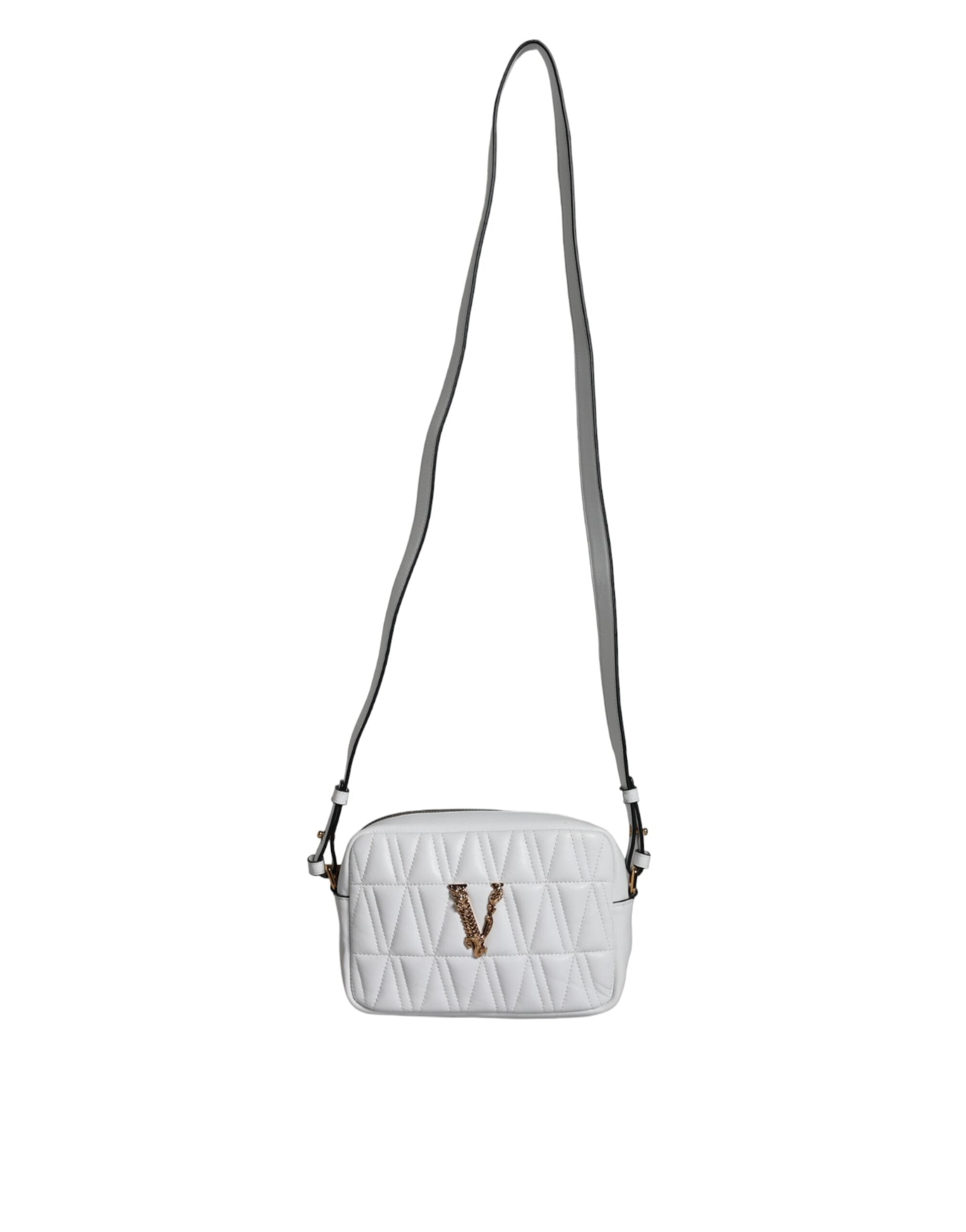 White Quilted Nappa Leather Crossbody Shoulder BagVERSACE Absolutely stunning, 100% Authentic, VERSACE bags. Brand logo, solid color, crossbody strap, zipper fastening. Model: Crossbody bag Material: 100% Nappa Leather Colour: White Black inner lining Zip