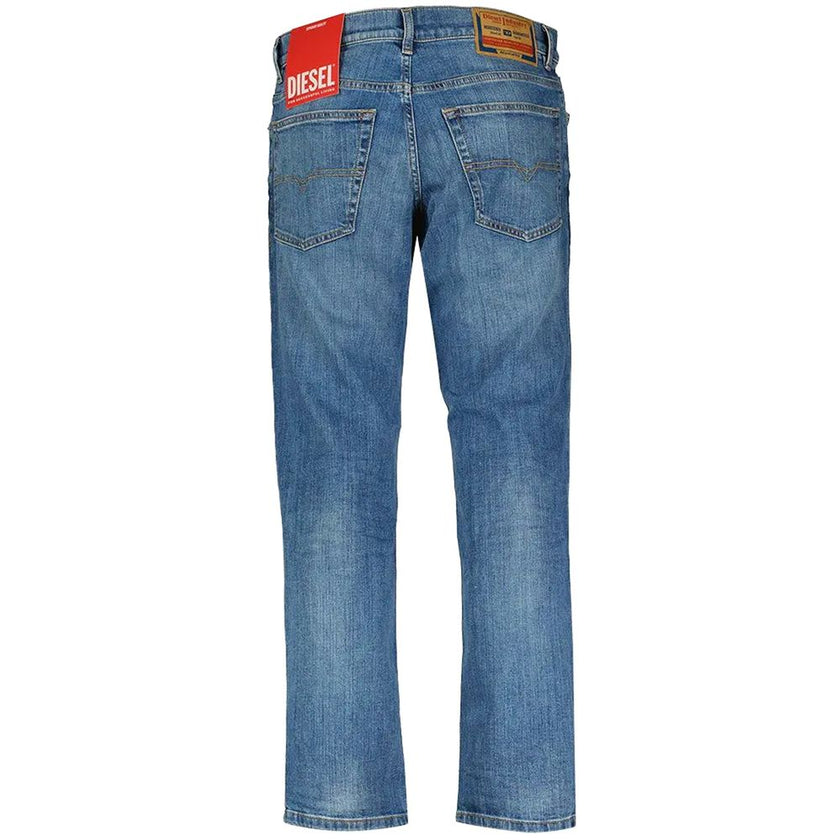 Blue Cotton Men JeansCrafted for the modern trendsetter, these Diesel jeans boast a confident slim-fit cut that contours your frame with a touch of urbane elegance. The expertly faded blue hue embodies a well-loved look from first wear, while the sturdy b