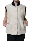 White WARRENFORD Shearling Leather Vest Coat JacketBURBERRY Absolutely stunning, 100% Authentic, brand new with tags BURBERRY WARRENFORD shearling vest jacket. Colour: White Model Vest jacket Material: 100% Sheep Shearling Full button closure Front pocket