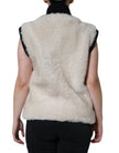 White WARRENFORD Shearling Leather Vest Coat JacketBURBERRY Absolutely stunning, 100% Authentic, brand new with tags BURBERRY WARRENFORD shearling vest jacket. Colour: White Model Vest jacket Material: 100% Sheep Shearling Full button closure Front pocket