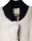 White WARRENFORD Shearling Leather Vest Coat JacketBURBERRY Absolutely stunning, 100% Authentic, brand new with tags BURBERRY WARRENFORD shearling vest jacket. Colour: White Model Vest jacket Material: 100% Sheep Shearling Full button closure Front pocket