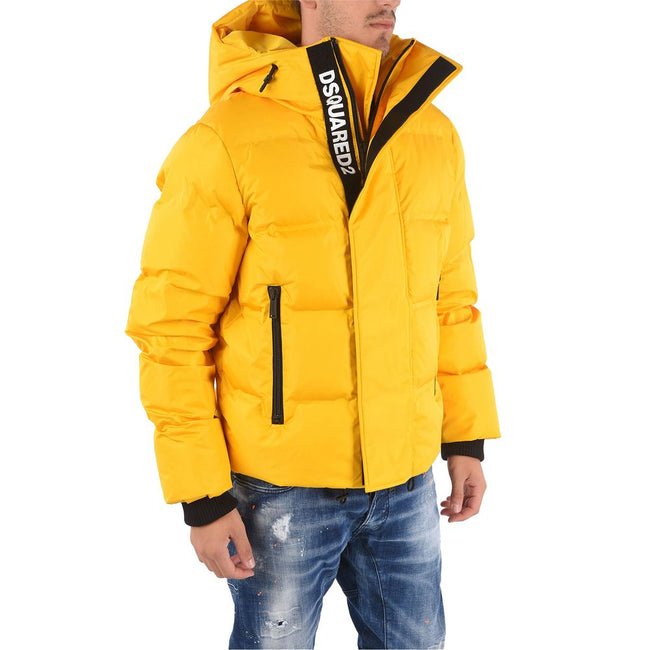 Yellow Nylon Men's Down JacketEmbrace the luxury and boldness of Dsquared² with this striking yellow nylon down jacket, designed for the man who dares to stand out. Crafted with sumptuous 100% pure goose down filling, it promises unparalleled warmth and c