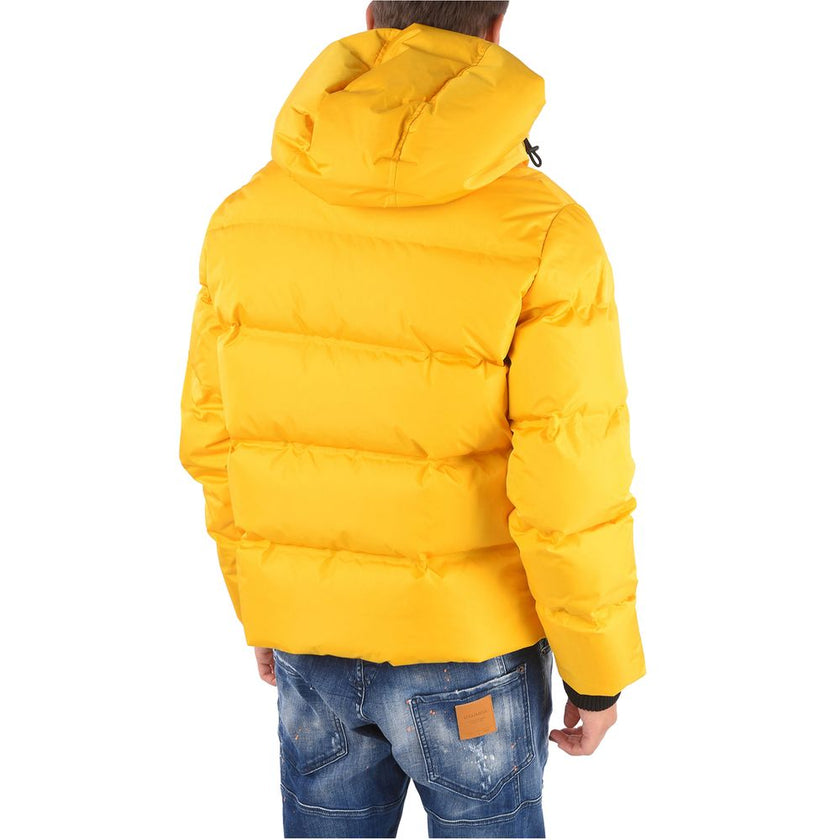 Yellow Nylon Men's Down JacketEmbrace the luxury and boldness of Dsquared² with this striking yellow nylon down jacket, designed for the man who dares to stand out. Crafted with sumptuous 100% pure goose down filling, it promises unparalleled warmth and c