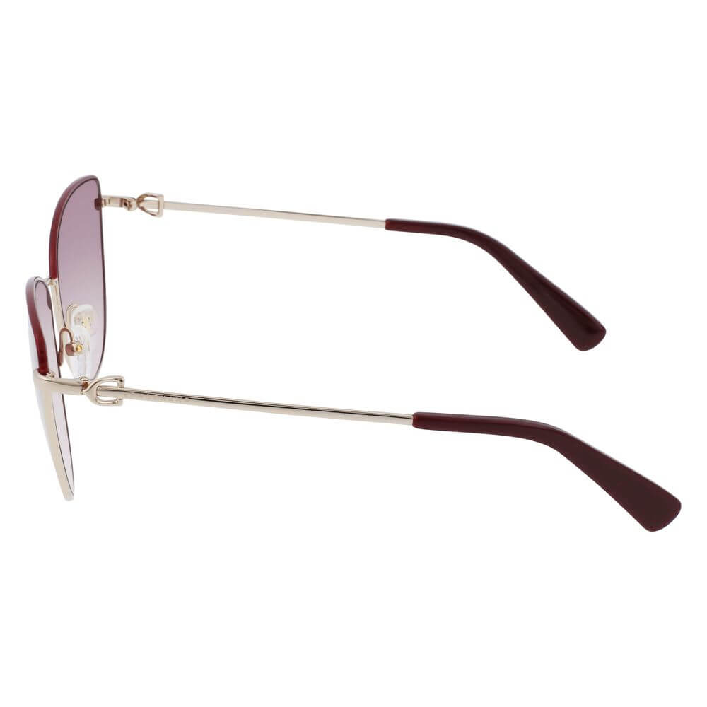 Gold Metal SunglassesSUNGLASSES LONGCHAMP WOMAN LO152S-721 (Lens/Bridge/Temple) 58/16/140 mm.Material: METAL.Colour: GOLDEN.Measures (Lens/Bridge/Temple): 58/16/140mm.GRADIENT RED.UV FILTER 2Gold Metal Sunglasses${tagsLongchampAulae Gold Metal Sunglasses