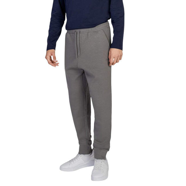 Gray Cotton Joggers (Workout Pants)The Boss Hadiko 10256713 01 50506141 men’s sweatpants combine comfort and style for everyday wear. Crafted from a soft sweatshirt fabric made of 95% cotton and 5% elastane/lycra, they offer a flexible fit that feels plea