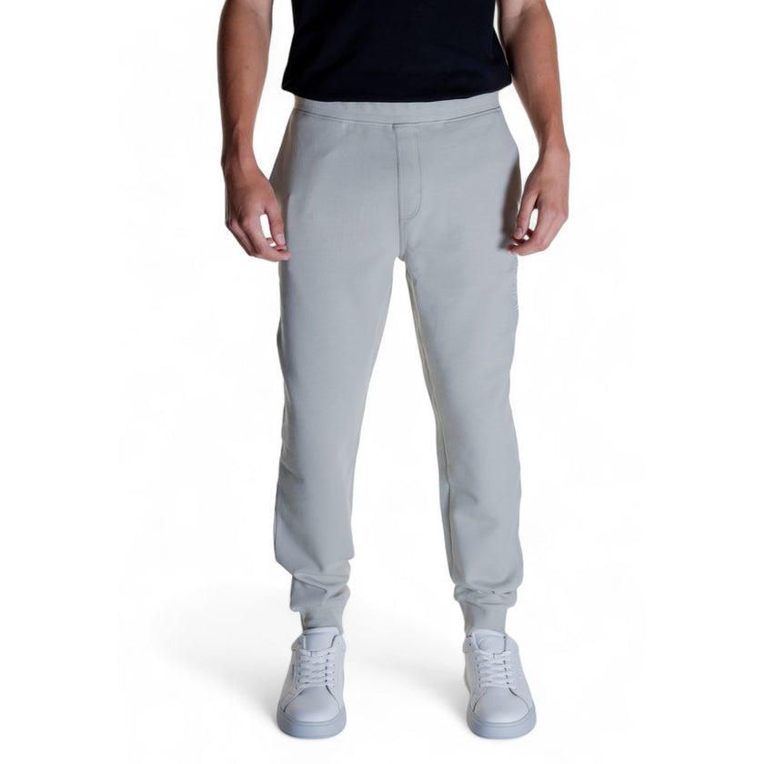 Gray Cotton Joggers (Workout Pants)Discover the Calvin Klein SHADOW EMBOSSED LOGO K10K113097 men’s sports pants, crafted from high-quality materials: 80% cotton, 16% recycled polyester, and 4% elastane/lycra. These pants provide exceptional comfort and a